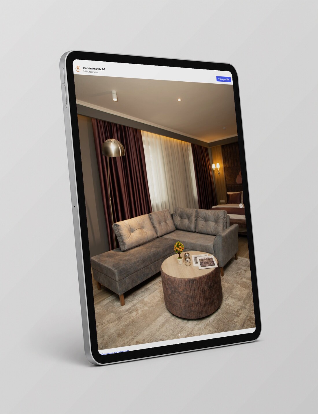 Mandarinnart Hotel & Suites Instagram post on a tablet